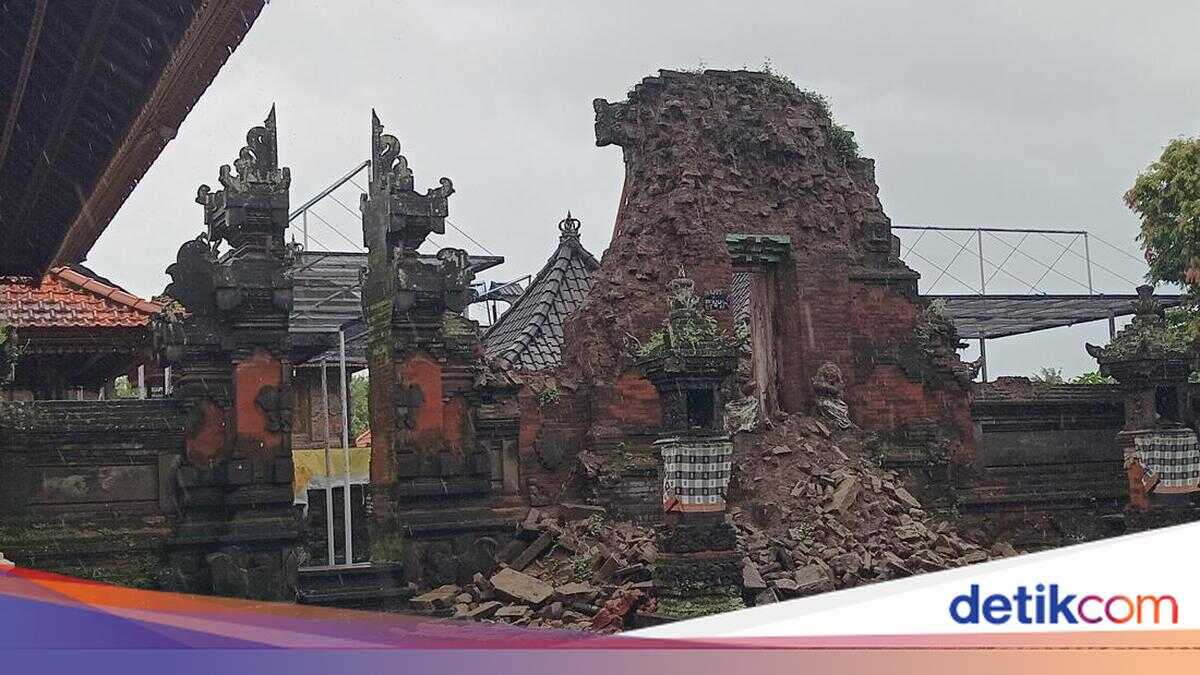 Heavy Rain Damages Temple Building and Fells Four Trees in Ubud