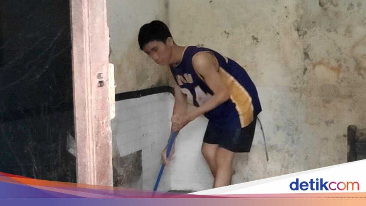 Residents Clean Up After Floods in Dewi Sri