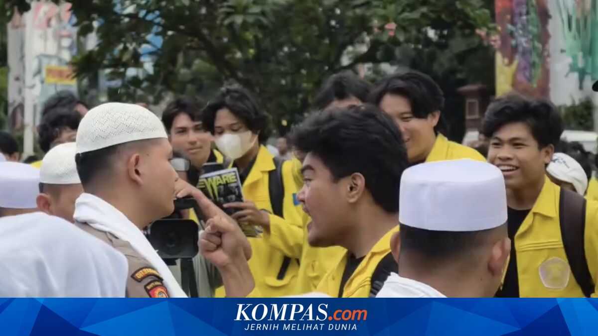 Students Point and Shout at Police During Protest at National Police Headquarters