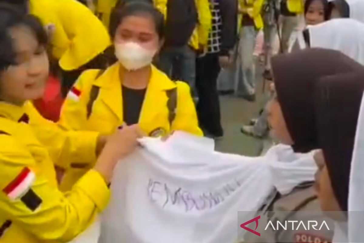 Police respond to student defacing female officer's headscarf during demonstration