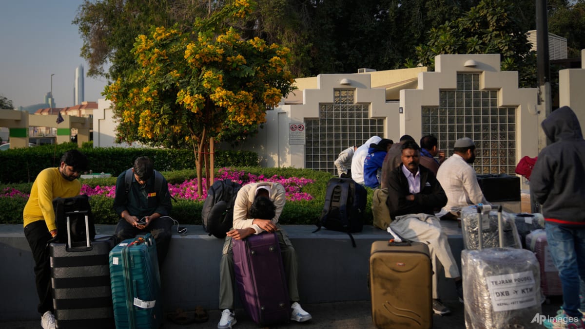 'Like sitting ducks': Fear and uncertainty mount for Southeast Asians stranded in Middle East