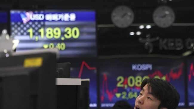 Asian stock markets slide as South Korea's Kospi plunges 12%