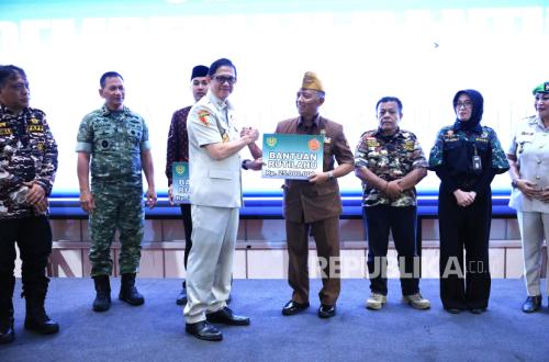 Veterans Receive Social Assistance During PPM Halal Bihalal and TNI Family Event