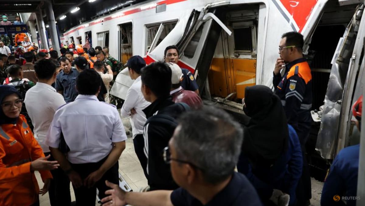 Indonesia train crash death toll rises to 14 as rescuers work to remove trapped passengers