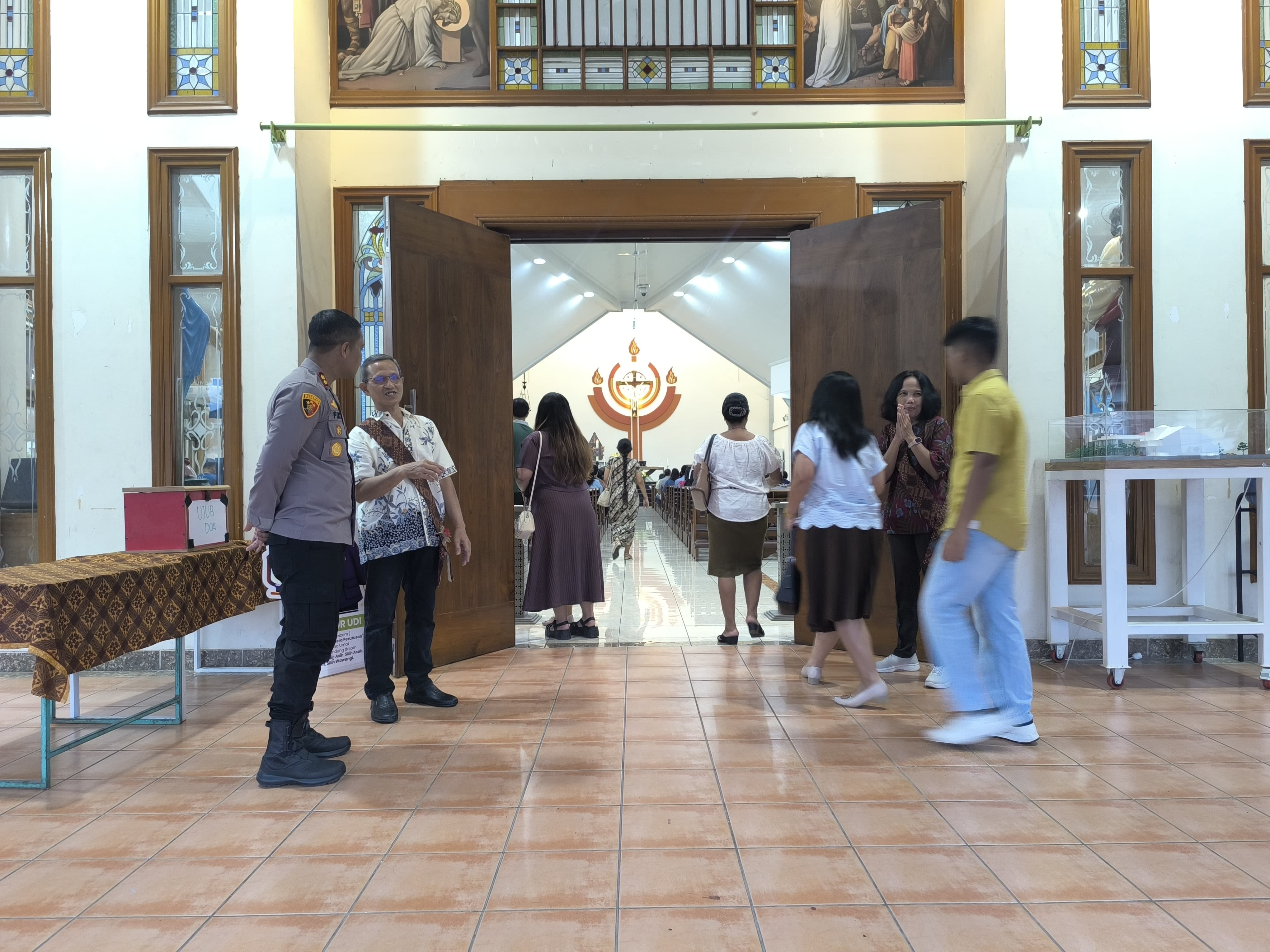 Karawang Police Force Monitors Catholic Church of St. Marinus Resinda