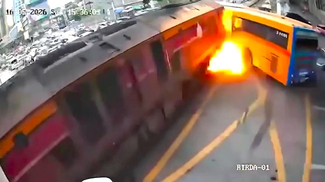 Footage Captures the Moment a Train Collides with Vehicles in Bangkok Traffic