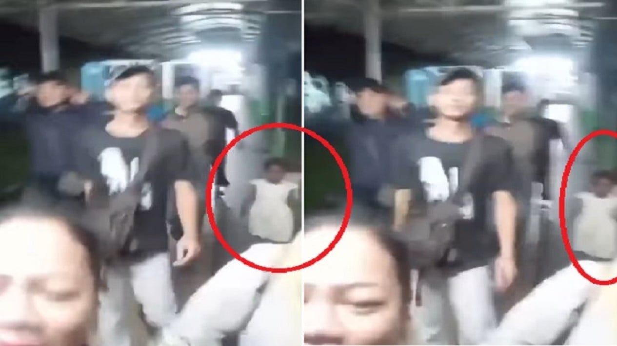 Mysterious Child in White Appears While Woman Vlogs in Hospital Corridor