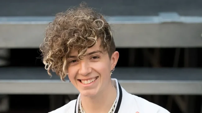 Police Pose as They Arrest Woman Who Hired a Hitman to Target a Boy Band Member