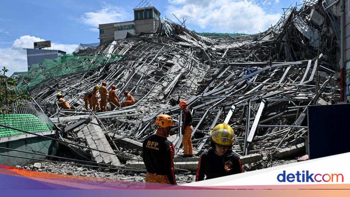 Nine-storey building collapses in the Philippines, victims still trapped