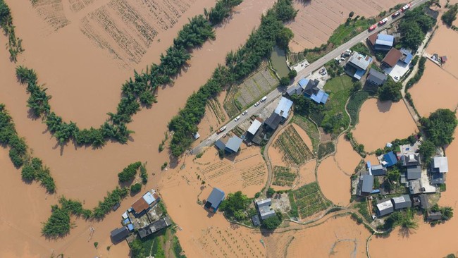 China Flood Disaster: Nine Dead as Chongqing Submerged in Water and Mud