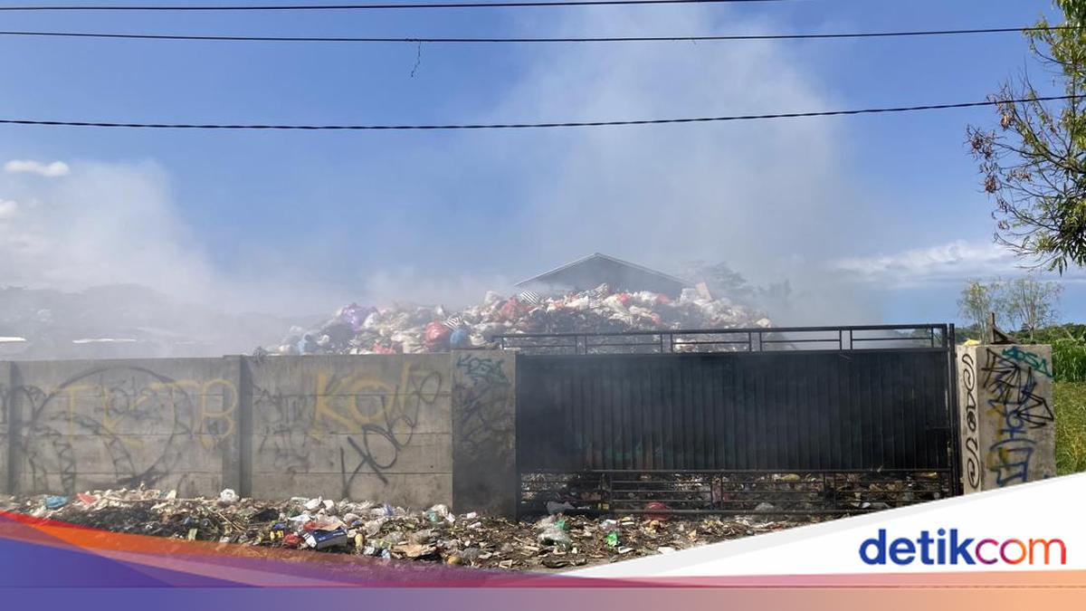 TPST Tojan waste smoulders as village government claims residue spontaneously combusts