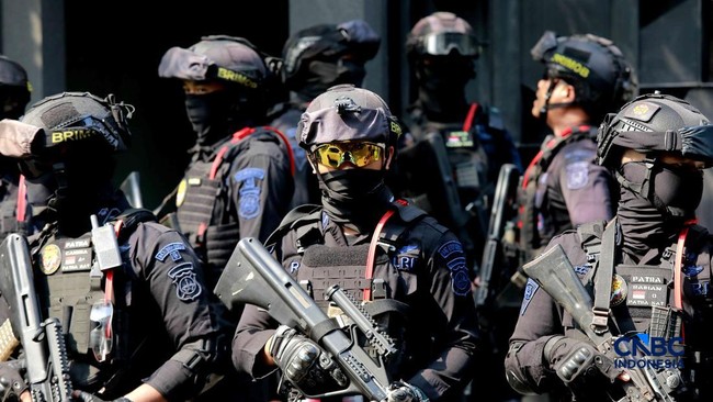 Armed Brimob Officers Guarding Silmy Karim's Residence