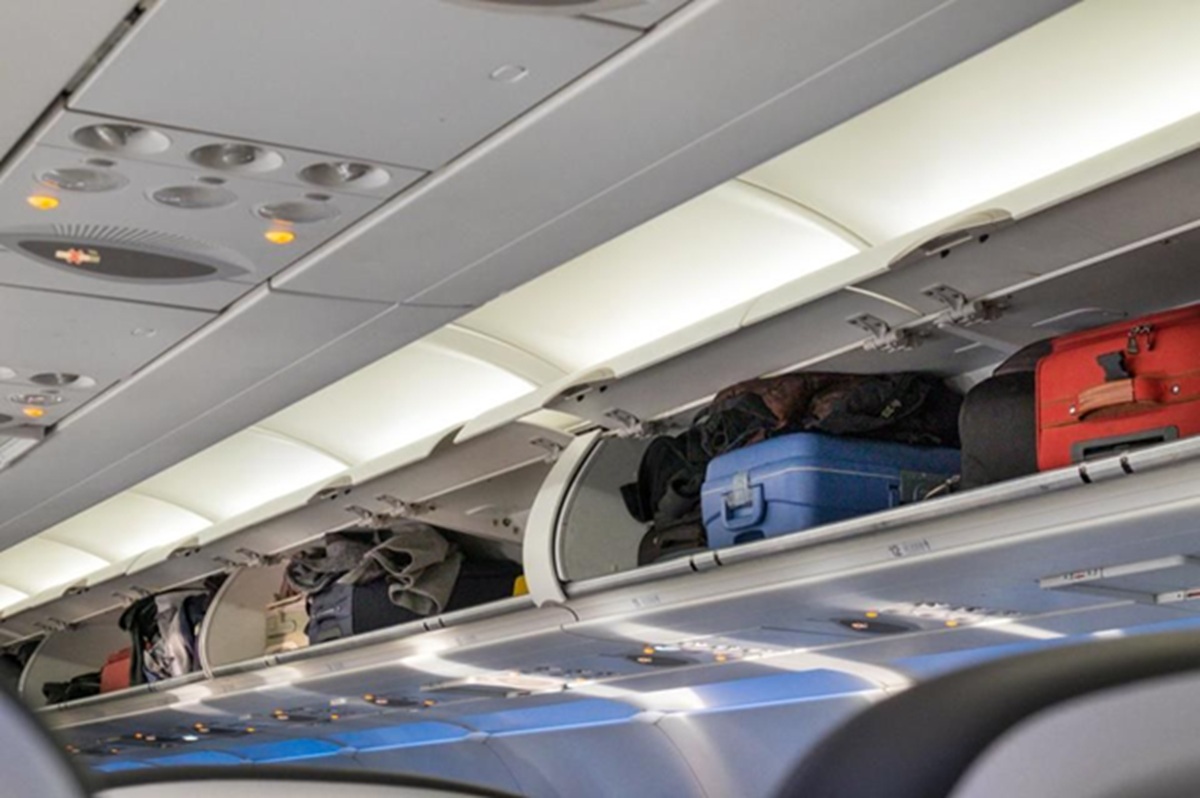 Do Not Grab Bags or Film Content During Emergency Aircraft Evacuations