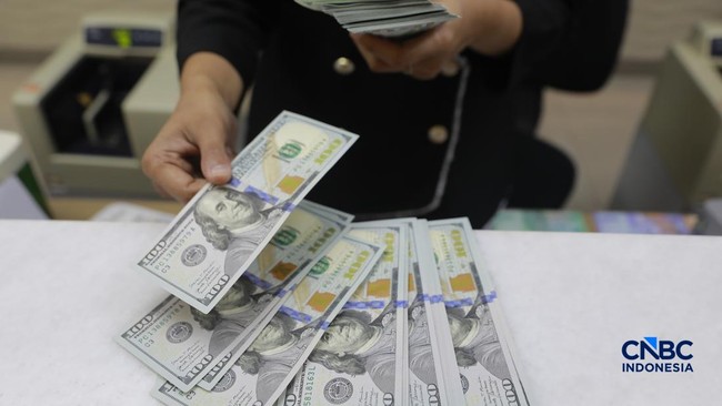 BI Limits Cash Dollar Purchases to US$10,000 Effective Today