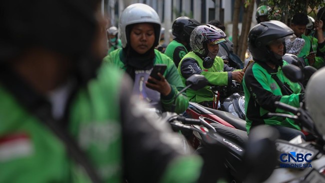 Grab-Gojek Commission Cut to 8%, but Drivers Fear Fare Hikes Will Deter Passengers
