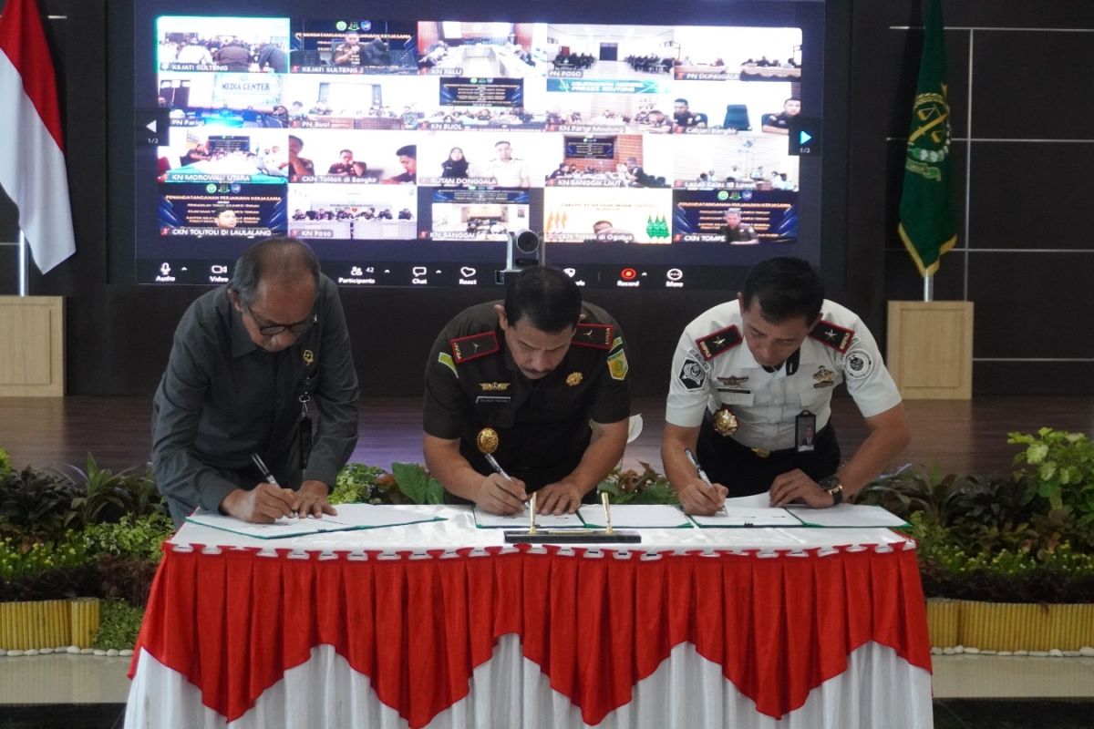 Central Sulawesi High Prosecutor's Office, High Court, and Prisons Directorate Agree on Electronic Trials