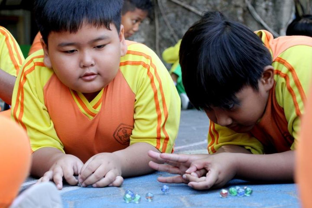 Traditional Games Enliven National Children's Day Commemoration in Solo