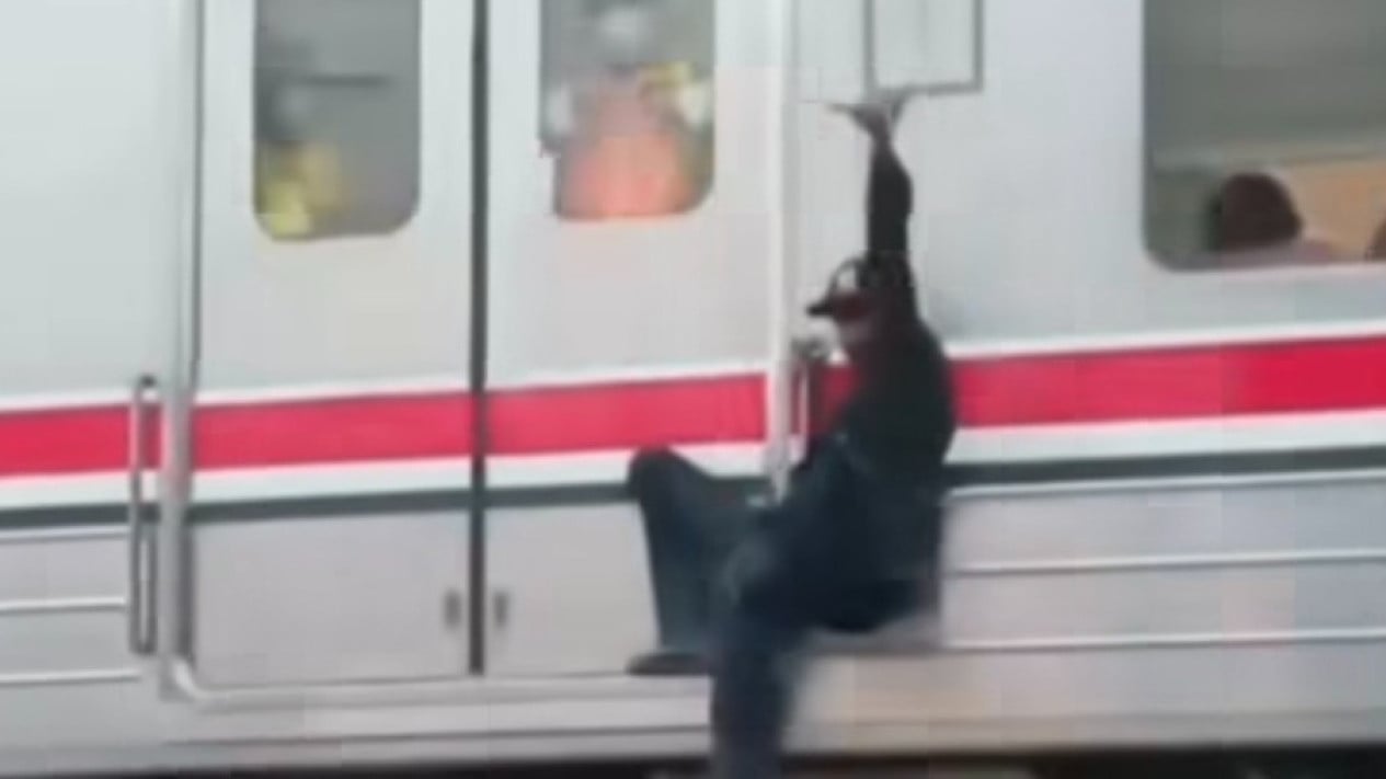 Man Blacklisted for Life After Hanging Off Side of Commuter Train in Jakarta