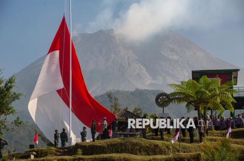 Giant Red and White Flag Flies on the Slopes of Mount Merapi