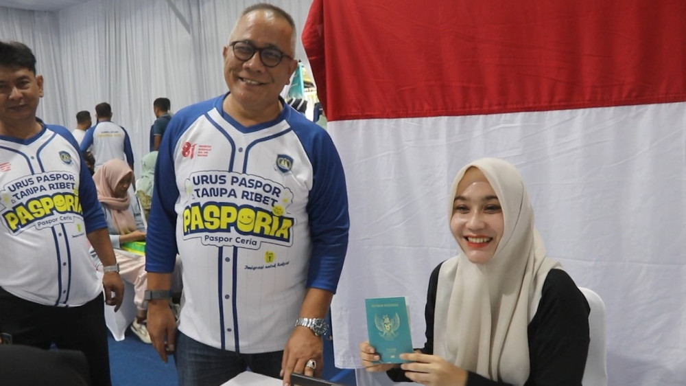 Immigration service brings passport processing to stadium for Independence Day
