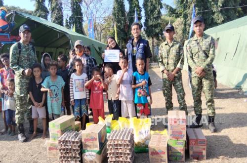 Berbagi Bahagia Foundation and Sharing Happiness Distribute Aid for Flores Earthquake Victims in NTT