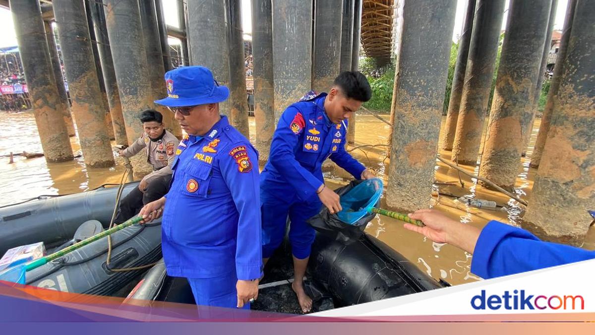 Green Policing at Pacu Jalur Arena, Riau Police Clean Up Rubbish Along Narosa Riverbank