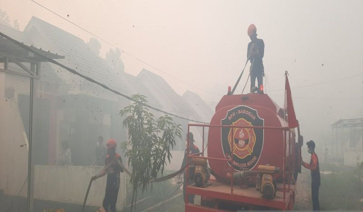 Forest and Land Fires Surround Housing Estate Near Syamsudin Noor Airport in Banjarbaru